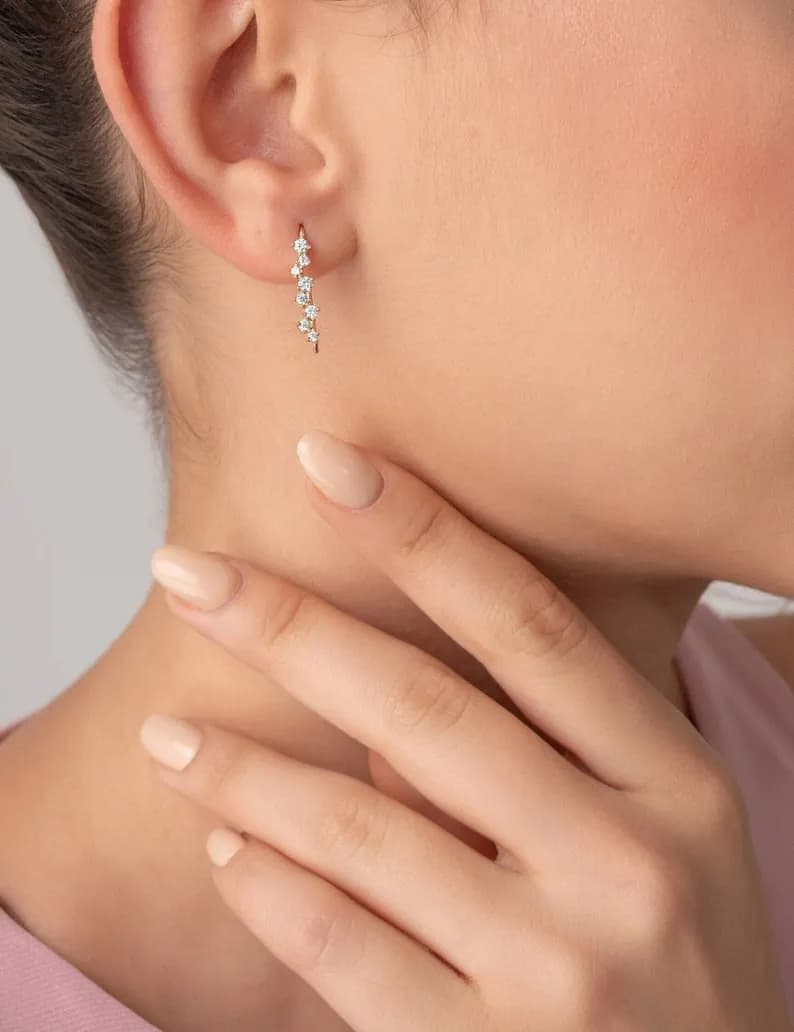 Zig Zag Diamond Drop Earrings in gold with clear stones